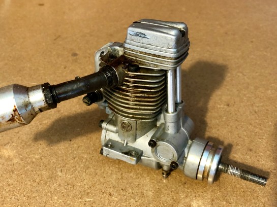 ASP FS61AR Four Stroke displaying signs of careless handling and a 'dipped in toffee' look.